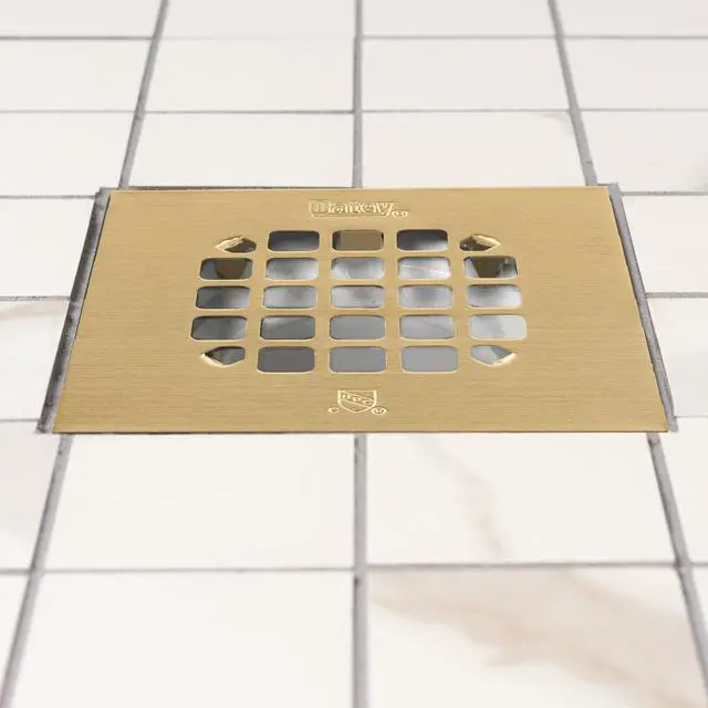 Alt view image 3 of 6 - Universal 4-1/4 in. Snap-Tite Square Shower Strainer in Brushed Gold
