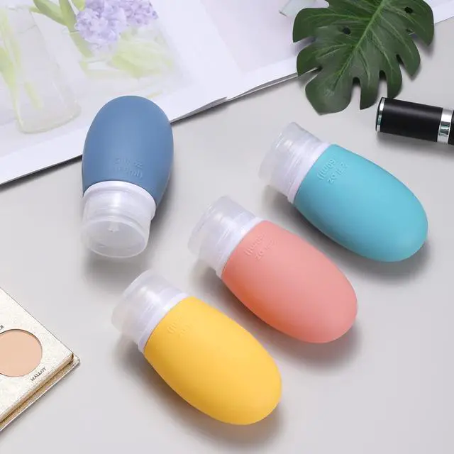 Alt view image 6 of 7 - Leak Proof Silicone Travel Bottles,4 Pack 2oz Liquid Squeezable Refillable Portable Travel Accessories/Cosmetic Containers,BPA Free,Travel Size Bottles for Toiletries Shampoo Conditioner Lotion