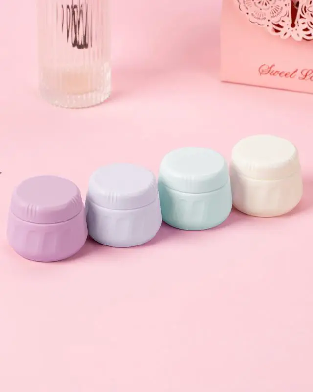 Alt view image 4 of 7 - Travel Containers for Toiletries, TSA Approved Travel Size Toiletries 4 Pack, Refillable Containers, With Clear Bag, Leak Proof Silicone Jars, Essentials Creams Jars Carrying Small Items