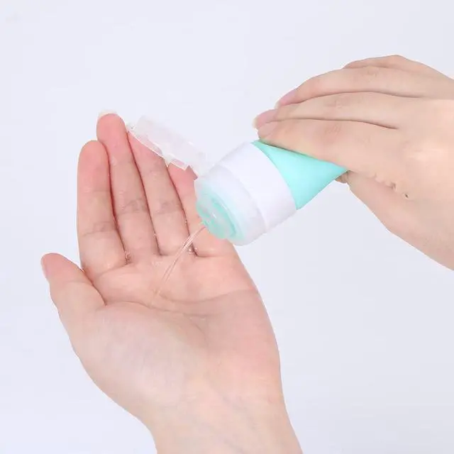 Alt view image 4 of 7 - Leakproof Silicone Refillable Squeezable Travel Tube with Keychain Hook for Cosmetic Toiletry Shampoo Sub-bottling Travel Bottle(60ml)