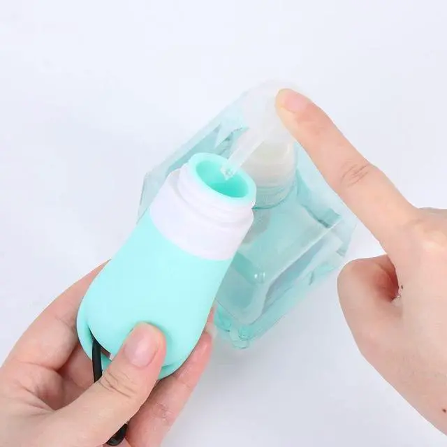 Alt view image 5 of 7 - Leakproof Silicone Refillable Squeezable Travel Tube with Keychain Hook for Cosmetic Toiletry Shampoo Sub-bottling Travel Bottle(60ml)