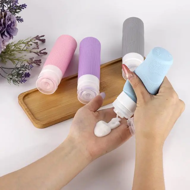 Alt view image 6 of 7 - Travel Toiletry Bottles - 3oz Leakproof Silicone Containers, Refillable Travel Accessories for Shampoo, Conditioner, Lotion, 4 Colors