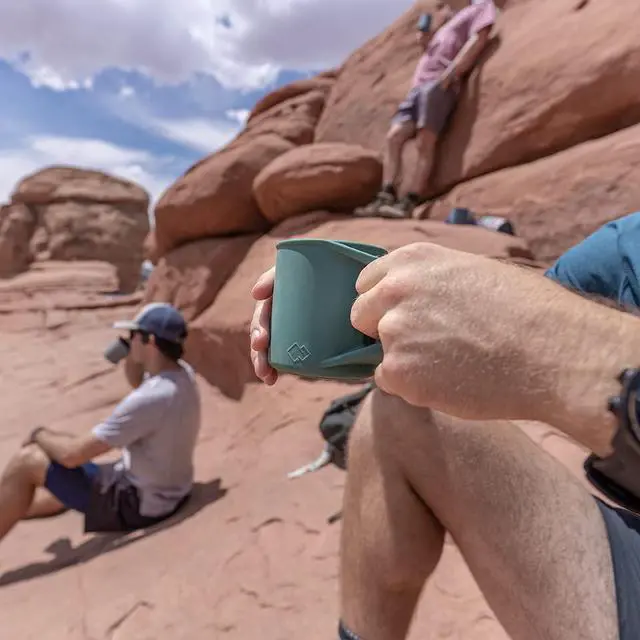 Alt view image 6 of 6 - Silicone Coffee Cup - Food Grade Silicone Camping Mug with Handle - Portable, Collapsible Coffee Mug - BPA Free, Dishwasher Safe and Microwave Safe 12- oz (Evergreen, 1 Pack)