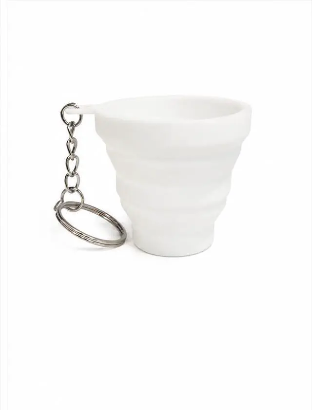 Alt view image 2 of 3 - Pocket sized silicone Shot Glass with Keychain, Collapsible Silicone Reusable travel cup, Cool novelty gift (white)