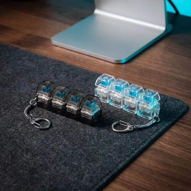 Alt view image 6 of 7 - Keyboard Fidget Toy, 2PCS Clicker Fidget Toys Decompression Button 4-in-1 Keyboard Keychain, Cool Stress Relief Fidget Toy for Adults (Clear Black and White)