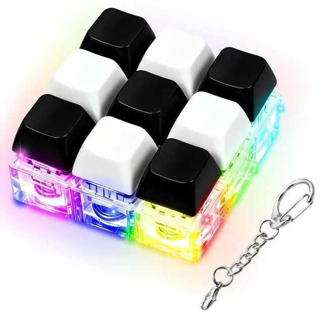 Main image of LED Light Keyboard Fidget Toy for Adults Kids, Glow Keyboard Fidget Keychain 9 in 1 Stress Relief Keyboard Decompression Button Finger Clicker Toys, Button Fidget Gifts to Relief Stress(Black White)