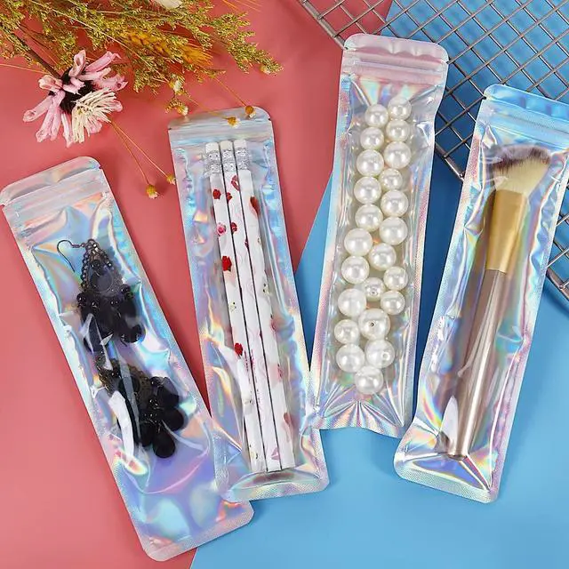Alt view image 6 of 7 - 100pcs Holographic Bags Packaging 2.4x9 inch, Resealable Foil Zip Pouch Smell Proof Baggies for Eyeliner Pens, Jewelry, Candy, Pretzel Rods