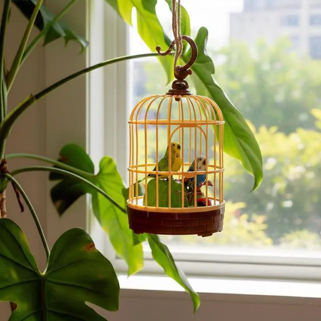 Alt view image 6 of 7 - Singing Bird in a Cage Toy, Voice-Activated Induction Birdcage with Talking Chirping Parrot, Realistic Moving Animation, Lifelike Sound, Motion Sensor Music Box, Desk Room Decor (No battery included)
