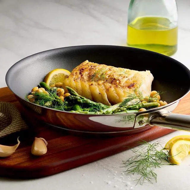 Alt view image 9 of 14 - Tramontina 10-Inch Non Stick Frying Pan, Tri-Ply Base Stainless Steel Skillet with Reinforced Nonstick Coating, Dishwasher and Oven Safe