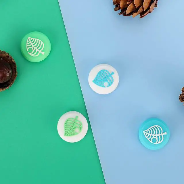 Alt view image 6 of 7 - Cute Thumb Grip Caps for Nintendo Switch/Lite/OLED Controller, Kawaii Leaf Joystick Analog Soft Silicone Button Stick Covers for NS Joy Cons (Blue&Green Leaf)