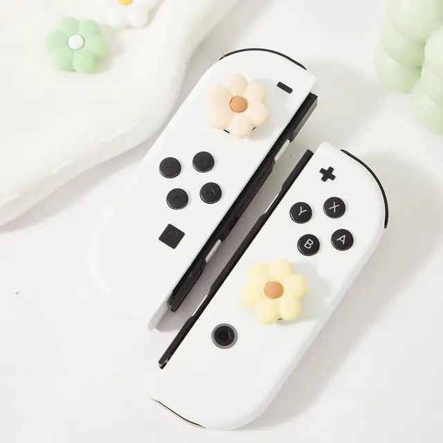 Alt view image 7 of 7 - Thumb Grip Caps Compatible with Nintendo Switch, Cozy Daisy Jostick Caps for Nintendo Switch Lite/OLED, Floral Silicone Joycon Grips Cover Switch Accessories-4PCS Sage Green/White Cozy Gaming (Daisy)