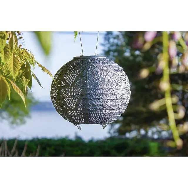 Alt view image 3 of 7 - Soji Stella Globe 8" LED Outdoor Solar Lantern, Handmade with Weather-Resistant UV Treated Fabric, Stainless Steel Hardware, Auto Sensor on/Off, for Patio, Deck, Garden (Metallic Blue)
