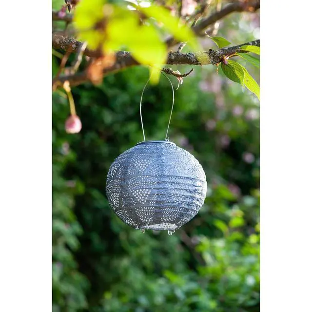 Alt view image 5 of 7 - Soji Stella Globe 8" LED Outdoor Solar Lantern, Handmade with Weather-Resistant UV Treated Fabric, Stainless Steel Hardware, Auto Sensor on/Off, for Patio, Deck, Garden (Metallic Blue)