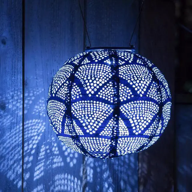 Alt view image 7 of 7 - Soji Stella Globe 8" LED Outdoor Solar Lantern, Handmade with Weather-Resistant UV Treated Fabric, Stainless Steel Hardware, Auto Sensor on/Off, for Patio, Deck, Garden (Metallic Blue)