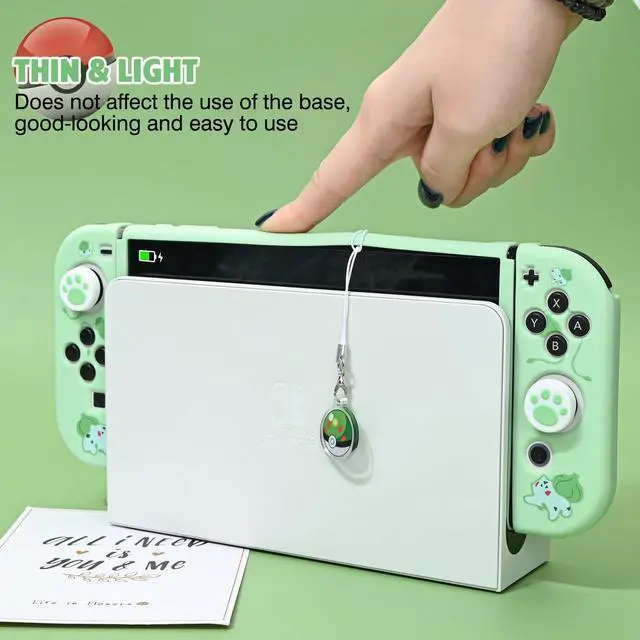 Alt view image 5 of 7 - Dockable Case Design for Switch OLED, Anti-Slip Shock-Absorption Protective Soft Carrying Case and Joy Con Controller with 1 PCS Elf Ball Pendant and 2 PCS Thumb Grip Caps-Green Frog