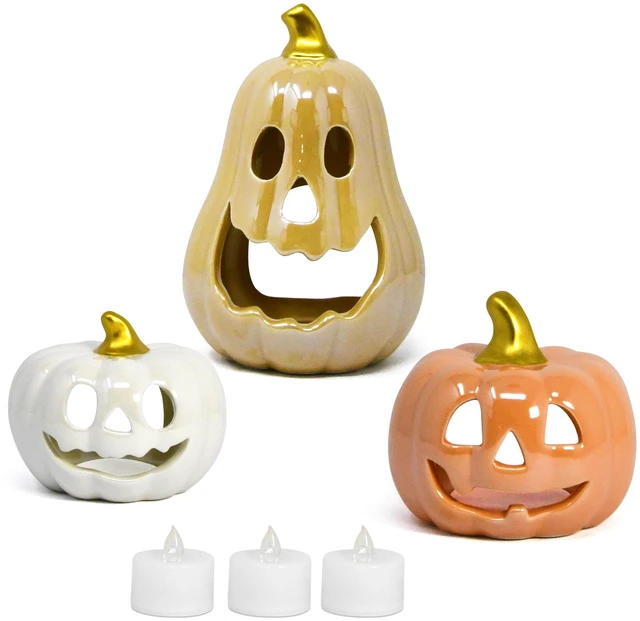 Main image of 3 Halloween Ceramic Pumpkin Tea Light Holders Jack O Lantern Tabletop Decor | Set of 3 ceramic jack o lantern pumpkin candle holders with 3 LED tea lights for Halloween tabletop, shelf and party decor
