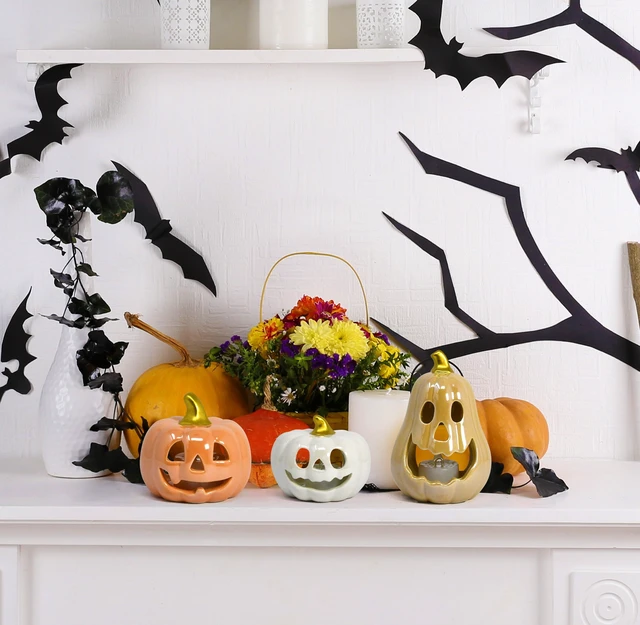 Alt view image 6 of 7 - 3 Halloween Ceramic Pumpkin Tea Light Holders Jack O Lantern Tabletop Decor | Set of 3 ceramic jack o lantern pumpkin candle holders with 3 LED tea lights for Halloween tabletop, shelf and party decor