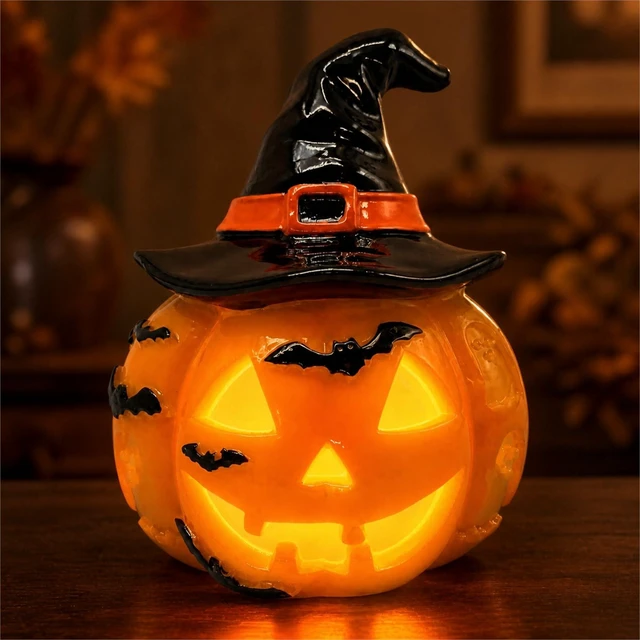 Main image of Light Up Pumpkin Lantern with Witch Hat, USB-Powered Halloween Decor | USB-powered resin pumpkin lantern with a witch hat and bat details, creating a decorative Halloween glow for indoor displays.