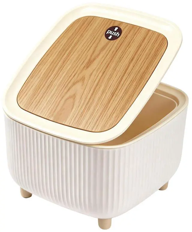 Main image of Small Desktop Trash Can with One Button Lid, 0.69 Gal, (Vertical Oak Grain) | 6.67" Mini Compact Size Fits Bedroom/Living Room/Bathroom/Office Desk, Easy To Clean