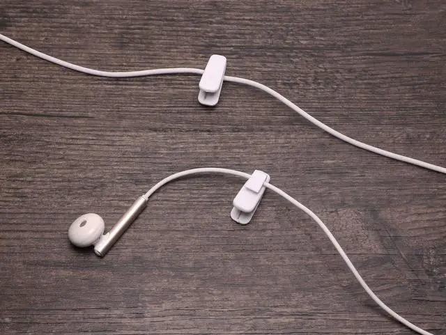 Alt view image 2 of 4 - 1 Inch Length Small Earphone Wire Clips Headphone Mount Cable Clothing Clip Earbud Clip to Keep Earphone/Microphone Cord in Place for 1.5mm Wires Diameter Round Wire Earphones,6Pcs (White)
