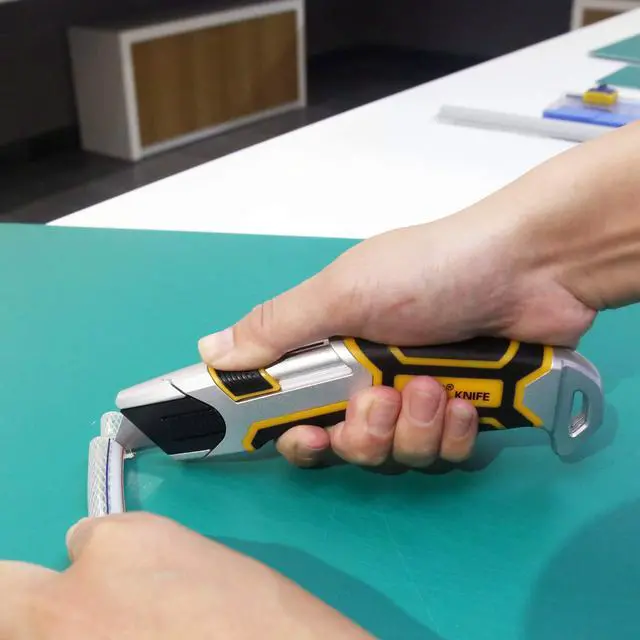 Alt view image 7 of 7 - Auto-Retractable Safety Utility Knife, Box Cutter of Quick Blade Change, 4 Spare Blades Storage in Handle