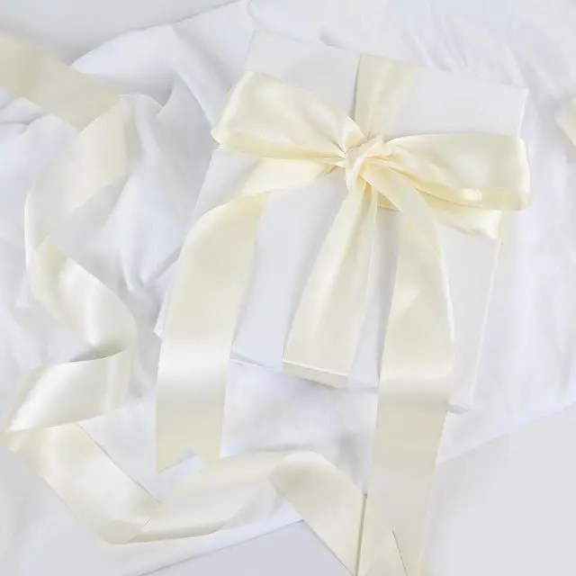 Alt view image 6 of 7 - Double Face Continuous Ivory Satin Ribbon 1-1/2 Inch x 50 Yards Polyester Ivory Ribbon for Gift Wrapping Weddings Party Hair Bows Invitations Decorations and More