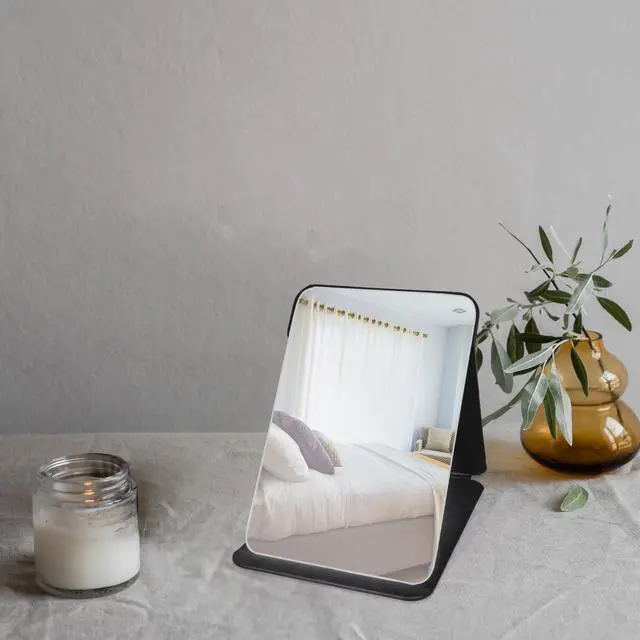 Alt view image 5 of 7 - Makeup Mirror, 6x8 Inches Portable PU Leather Mirror, Folding Desktop Vanity Mirror with Adjustable Stand for Vanity Table, Office, Travel (M, Black)