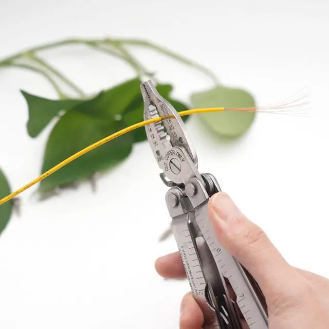 Alt view image 7 of 7 - PLB024 Stainless steel multi-function plier. 24 functions with saw, wire strippers and screwdrivers, can and bottle opener, knife, file. Hand size and easy to carry and use indoor, outdoor