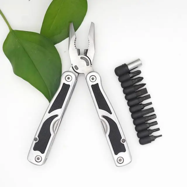 Alt view image 3 of 7 - PLB027 stainless steel multi-function plier. 27 functions with knife, fish scaler, screwdrivers, can and bottle opener, 11 bits and 1 socket. Hand size and easy to carry and use indoor, outdoor
