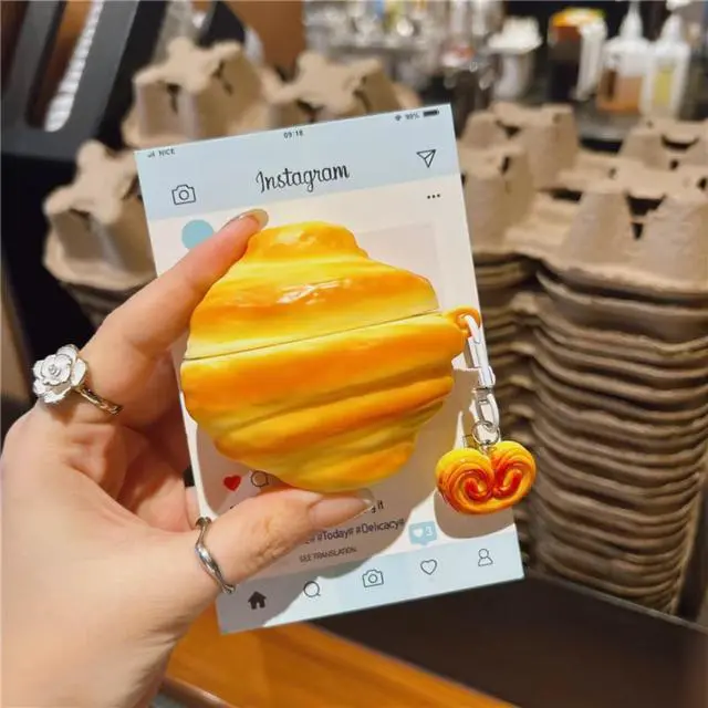 Alt view image 4 of 6 - 3D Croissant Protective Cover, Compatible with AirPods Pro 1st 2nd 3rd Gen & AirPods 1st 4th Gen, Cute Funny Food-Themed Design, Durable Silicone Cover (Yellow,for Airpods 3)