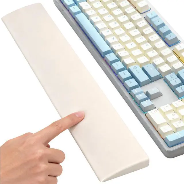 Main image of Silicone Wrist Rest for Full-Sized Mechanical Keyboards - Honeycomb Anti-Slip Base, 17.6-Inch Palm Support for Ergonomic Typing and Pain Relief (Ivory White, 17.6)