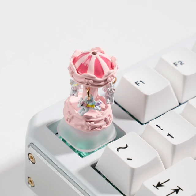 Main image of Artisan Carousel Keycap for Mechanical Keyboards, Pink Rotatable Design with RGB Bottom Glow, Hand-Painted Resin, 1U Size, MX Switch Compatible, Decompressing Gaming Keycap (XZMM-01)