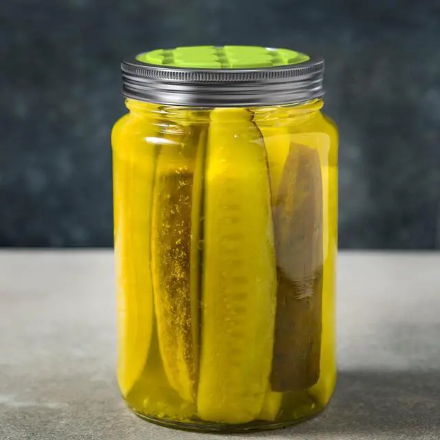 Alt view image 2 of 5 - Fermentation Lids for Wide Mouth Mason Jars - 4 Pack Silicone Lids | One-way waterless airlock valve, BPA-free self-burping silicone lids. Includes 4 colors: Blue, Red, Green & Purple.