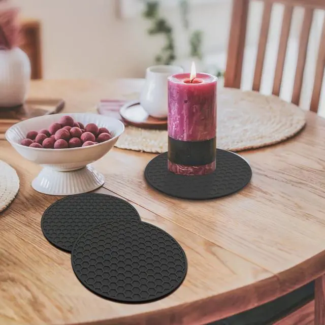 Alt view image 4 of 7 - TENOC Silicone Non-Slip, Heat Resistant & Water-Trapping Trivet Mats for Water Glasses & Teacup & Coffee Cup & Dishes & Cookware, Multipurpose Kitchen Table Coaster, 3.5-Inch, 3 Pcs, Black