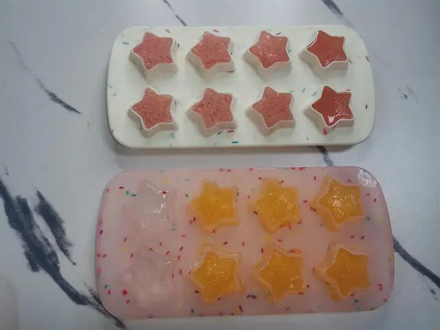 Alt view image 2 of 6 - Ice Cube Molds Silicone Set of 2 Star Shaped Reusable Silicone Ice Maker for Whiskey Drinks and Cocktails Making Fun Ice Cubes and Gummies