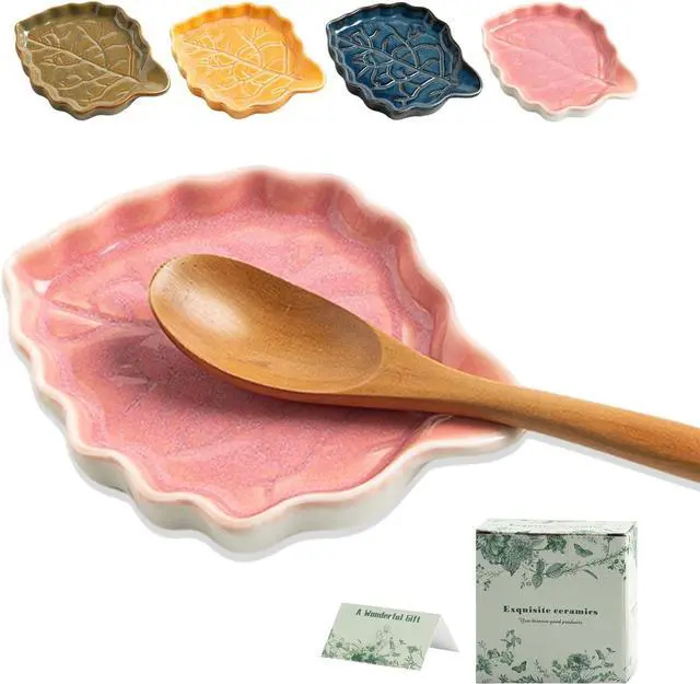 Main image of Mecaikru Ceramic Leaf Spoon Rest for Stove Top and Kitchen Counter | Raised wavy edges catch sauce, oil and food drips to help keep your stove top and kitchen counter clean while cooking.