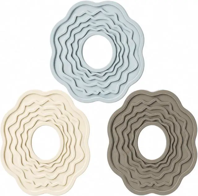 Main image of Silicone Trivets for Hot Dishes, Pots and Pans, 8 Inch Hot Pads for Kitchen | Soft blue, cream and warm gray flower-inspired trivets add calm decor while protecting tables and counters from heat