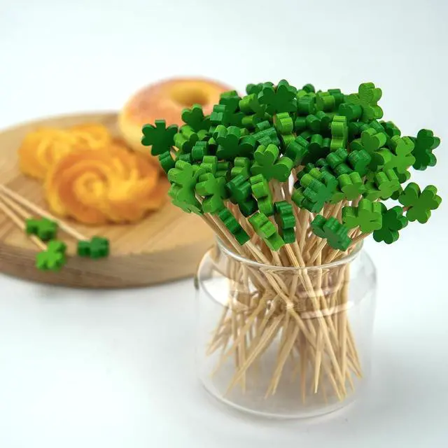 Alt view image 3 of 6 - 100 Count Green Shamrock Cocktail Picks for St. Patrick's Day | 4.7-inch bamboo shamrock toothpicks for drinks and appetizers; Irish cupcake toppers and clover party decorations.