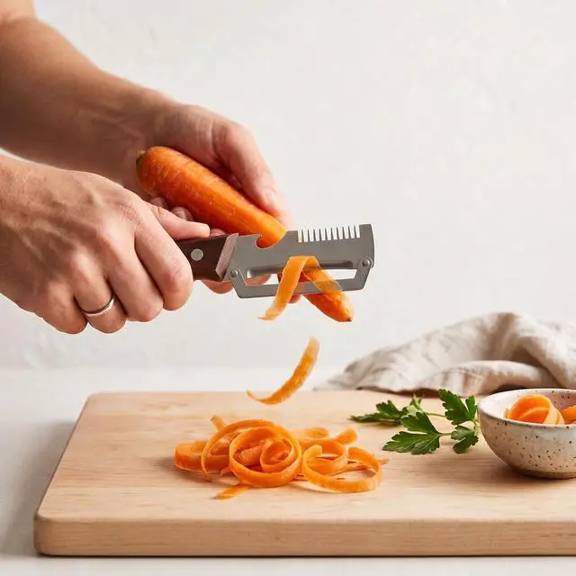 Alt view image 4 of 7 - Multifunctional Vegetable Peeler with Wooden Handle | Bottle Opener, Vegetable Slicer, Cabbage Shredder, Stainless Steel, Kitchen Essentials 2026