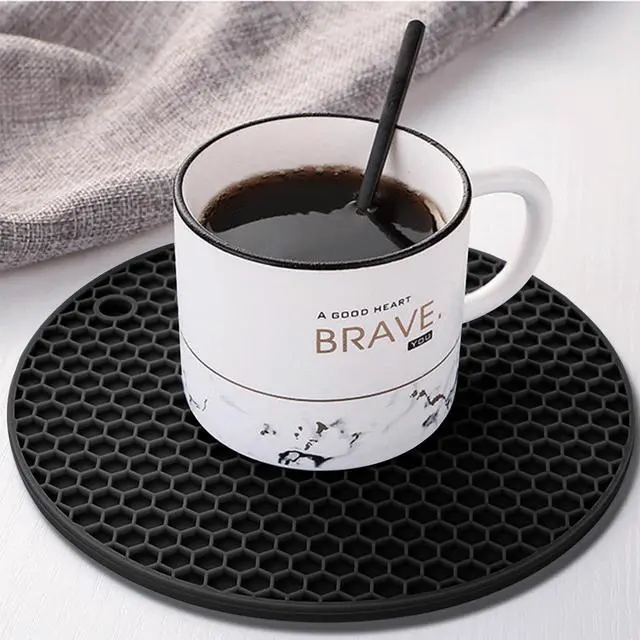 Alt view image 7 of 7 - TENOC Silicone Non-Slip, Heat Resistant & Water-Trapping Trivet Mats for Water Glasses & Teacup & Coffee Cup & Dishes & Cookware, Multipurpose Kitchen Table Coaster, 5.5-Inch, Black