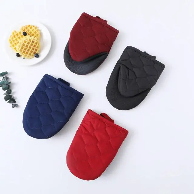 Alt view image 2 of 4 - Glynniss Heat Resistant Mini Oven Mitts, 2 Pcs of Short Silicone Oven Mits, Non-Slip Grip Surfaces Kitchen Gloves for Cooking, Machine Washable with Hanging Loops Oven Gloves (5.5x7 inches, Wine)