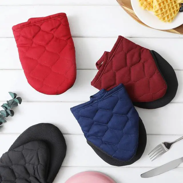 Alt view image 3 of 4 - Glynniss Heat Resistant Mini Oven Mitts, 2 Pcs of Short Silicone Oven Mits, Non-Slip Grip Surfaces Kitchen Gloves for Cooking, Machine Washable with Hanging Loops Oven Gloves (5.5x7 inches, Wine)