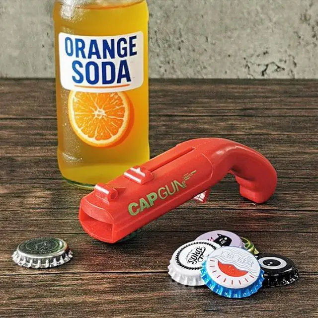 Alt view image 2 of 6 - cap gun bottle opener launcher shooter funny shooting gun creative beverage bottle opener, suitable for party games, family gatherings, outdoor barbecues (2pc black red)