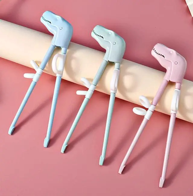 Alt view image 2 of 7 - Training Chopsticks for Kids, Jawbush 3 Pairs Reusable Kids Chopsticks, Cute with Dinosaur Head, Non-slippery Indented Tips and Adjustable Finger Loops, Easy to Use and Clean, Dishwasher Safe