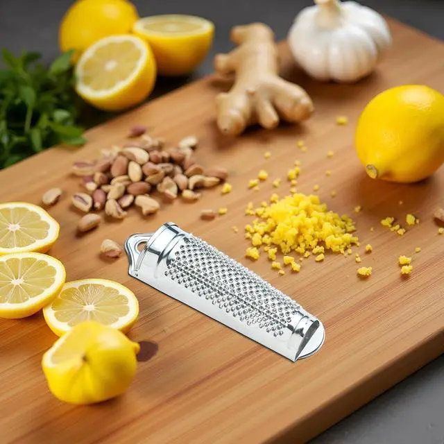 Alt view image 4 of 7 - Silver Multifunctional Kitchen Stainless Steel Ginger Garlic Nutmeg Grater Nut Walnut Lemon Hand Planer Tool Lemon ZesterDurable and Professional Kitchen Tool Garlic Presses