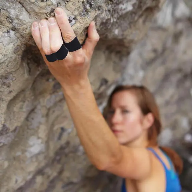 Alt view image 5 of 6 - 2 Rolls Finger Tape, Extra Strong Adhesive 0.6-Inch x 32-feet Athletic Tape for Fingers, Hands, & Toes, Rock Climbing Tape, Skin-Friendly Sports Tape for Outdoor Sports Climbing Football (Black)