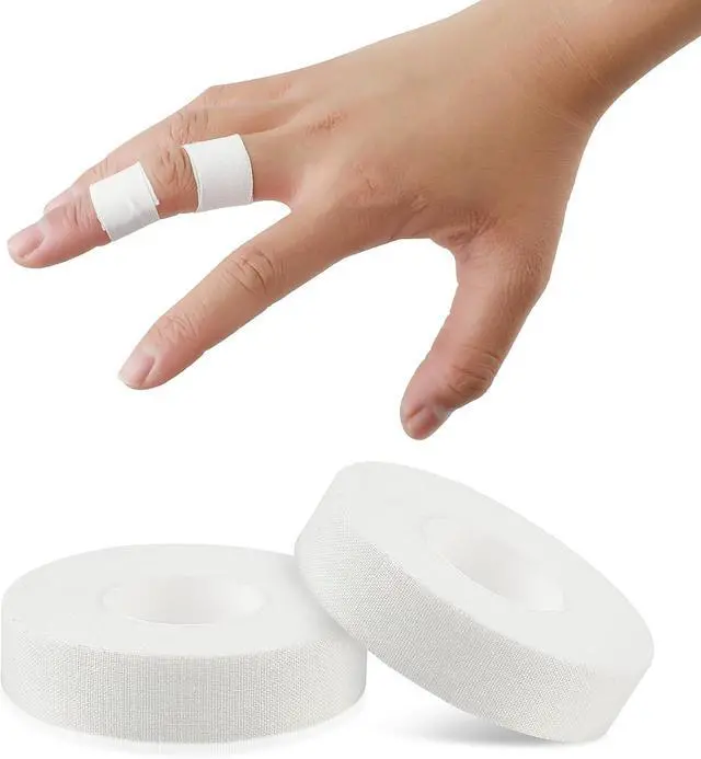 Main image of COMNICO Finger Tape, White Extra Strong 0.6-Inch x 32-feet Athletic Tape for Fingers Feet Sweat Volleyball Finger Tape for Outdoor Sports Climbing Football (2)