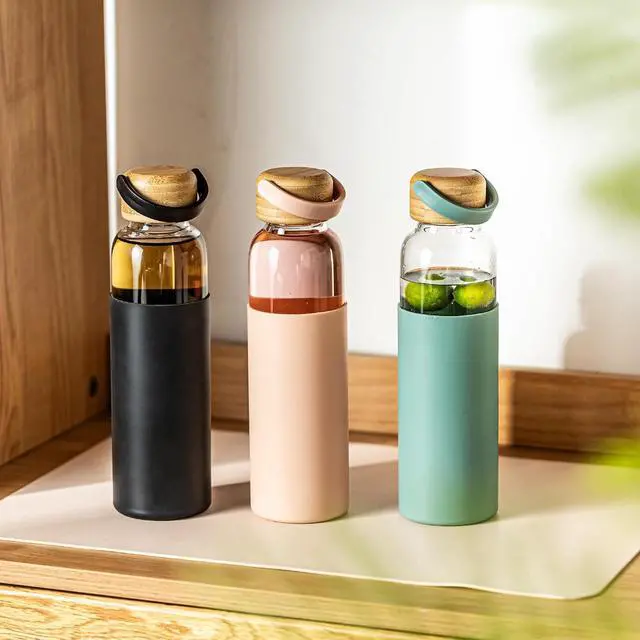Alt view image 4 of 7 - 21oz Borosilicate Glass Water Bottles with Silicone Non-Slip Sleeve & Leak-Proof Lid-Reusable Drink Bottle for Office,Travel,Gym,Hiking-BPA Free,Ideal Gift for Home,Car &Fitness (Green)