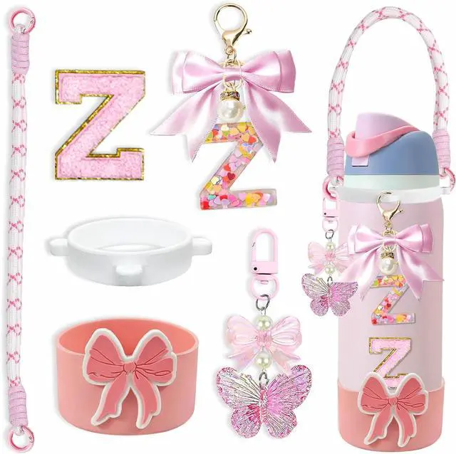 Main image of Bow Silicone Boot Set for Owala Water Bottle 24/32/40oz, Strap | Bow silicone boot set with strap, keychains & charms for Owala FreeSip 24/32/40oz bottles, adds style and protection.