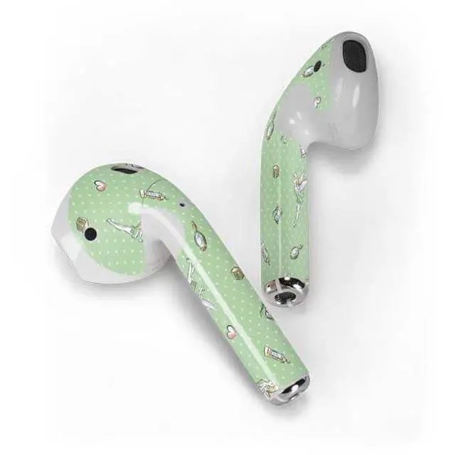 Alt view image 2 of 4 - Decal Audio Skin Compatible with Apple AirPods - Officially Licensed Disney Tinker Bell Trinkets Pattern Design